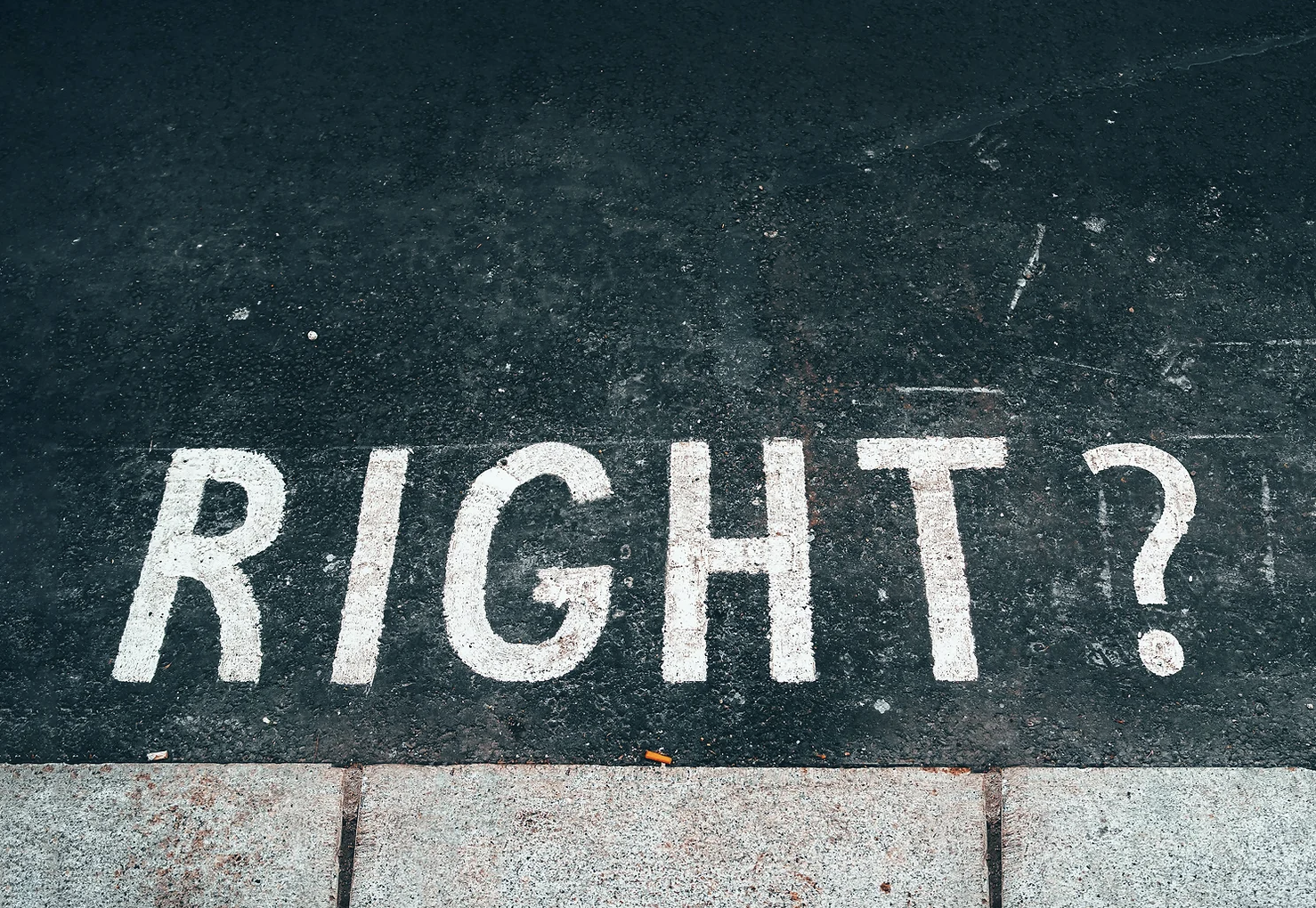 "Right?" written on road with chalk